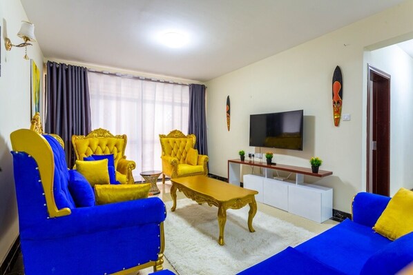 Elite Apartment | Living area | 30-inch Smart TV with digital channels, TV
