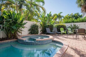 A heated pool - Mango Bay – Luxury Island Home w/ Heated Pool, Spa & Walk To Beach (Holmes Beach)