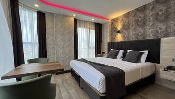 Ropa de cama de alta calidad y minibar