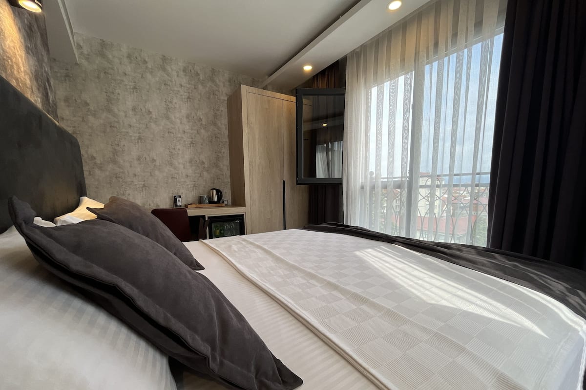 Habitación doble urbana | Ropa de cama de alta calidad y minibar 