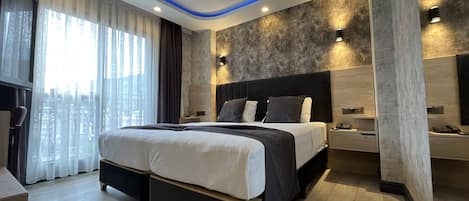 Ropa de cama de alta calidad y minibar