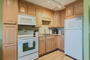 Oven, stovetop, coffee/tea maker, cookware/dishes/utensils