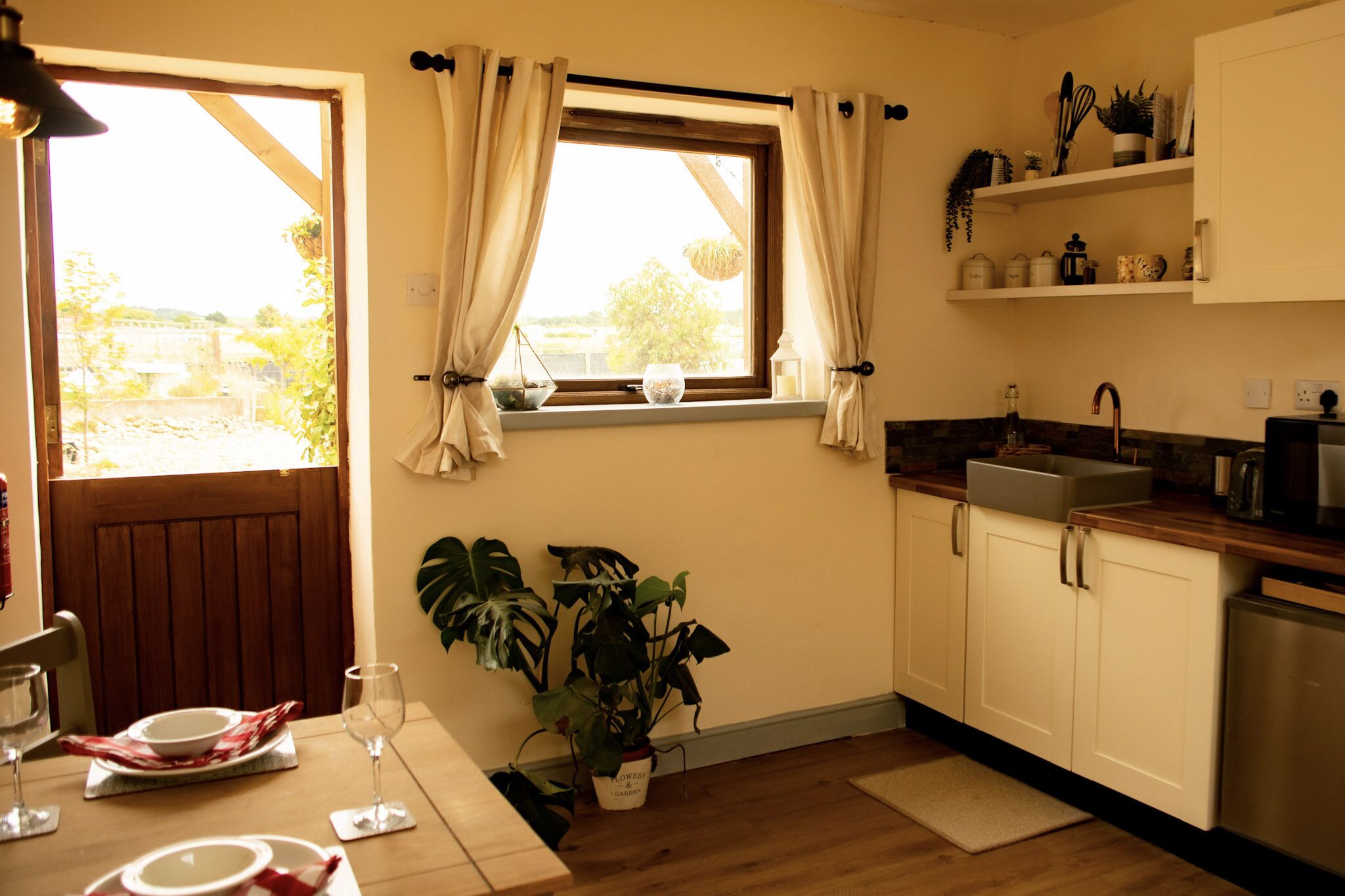 Fridge, microwave, toaster, cookware/dishes/utensils