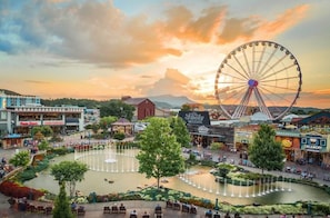 A Ferris wheel, a water fountain, and a Creamery restaurant.