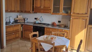 Apartment | Private kitchen | Fridge, oven, stovetop, dishwasher