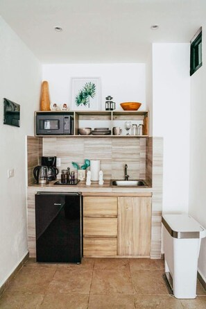 Fridge, microwave, stovetop, coffee/tea maker