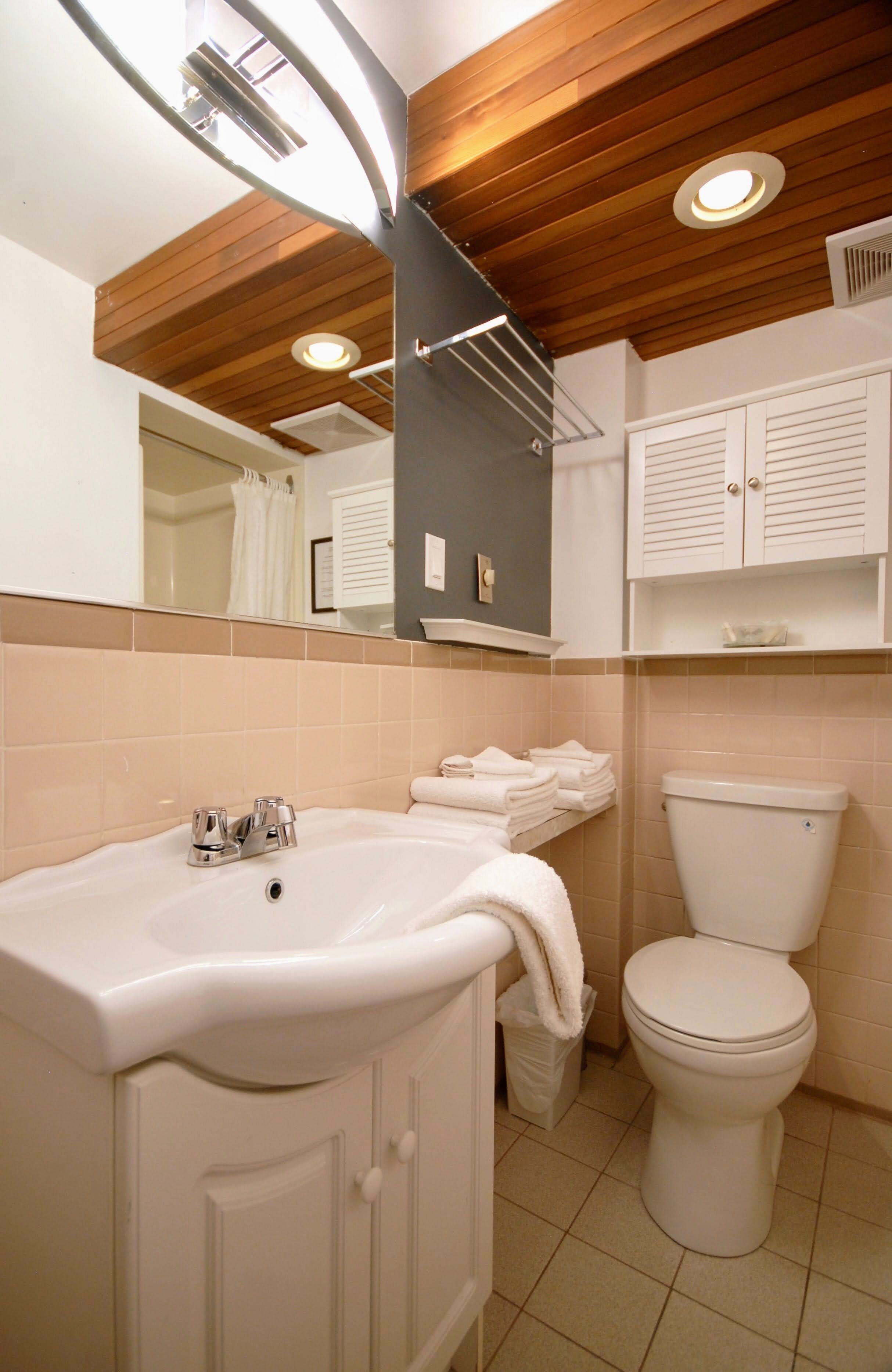 junior suite, 2 bedrooms, non smoking, private bathroom | bathroom | shower, rainfall showerhead, hair dryer, towels