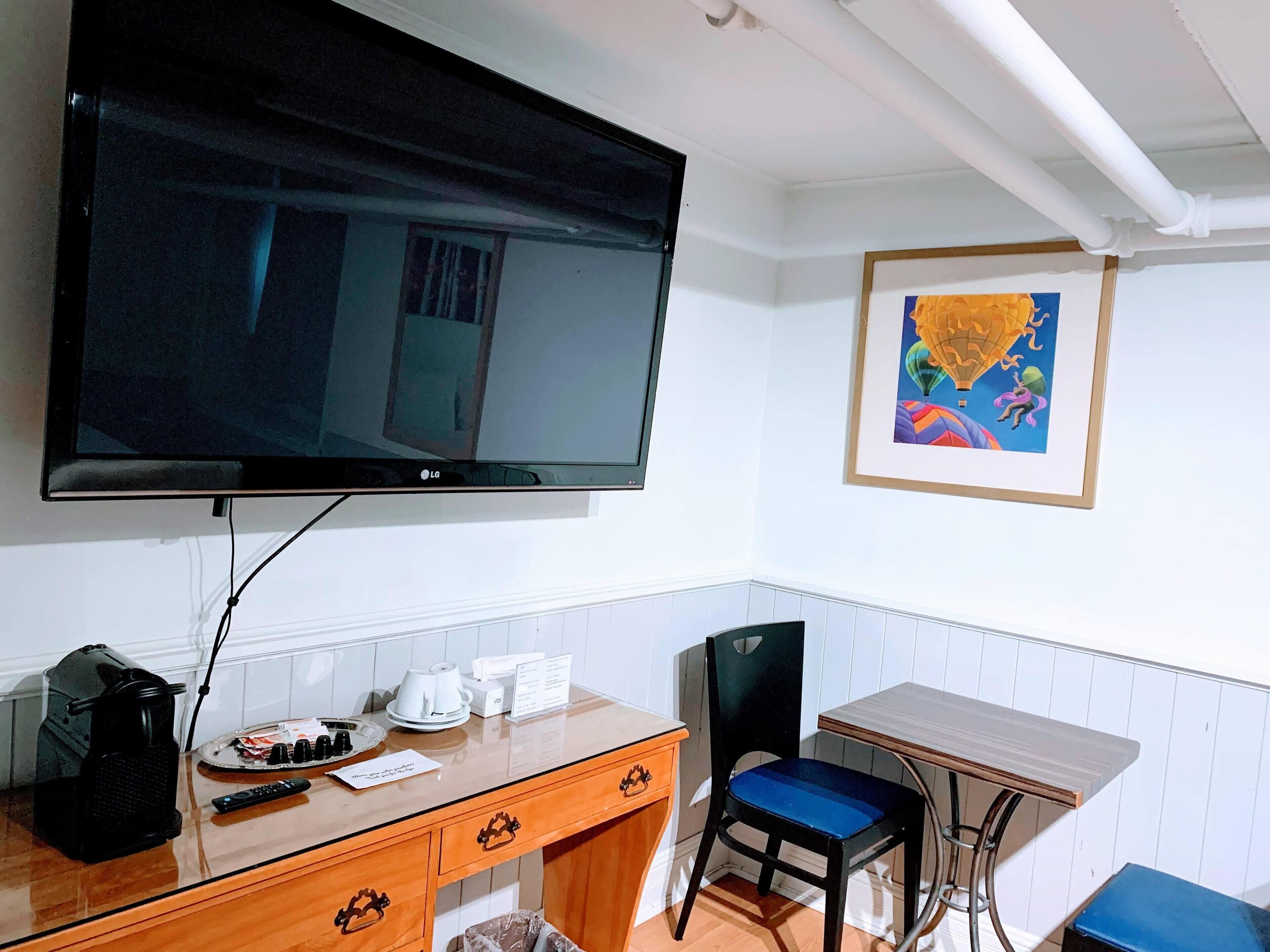 economy room, 1 king bed, non smoking, private bathroom, basement | 1 bedroom, iron/ironing board, free wifi, bed sheets