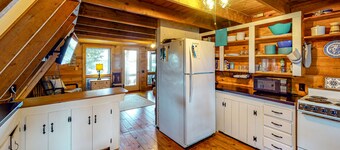 Waterfront A-frame on George’s Pond with views, private dock, beach, kayaks, SUP