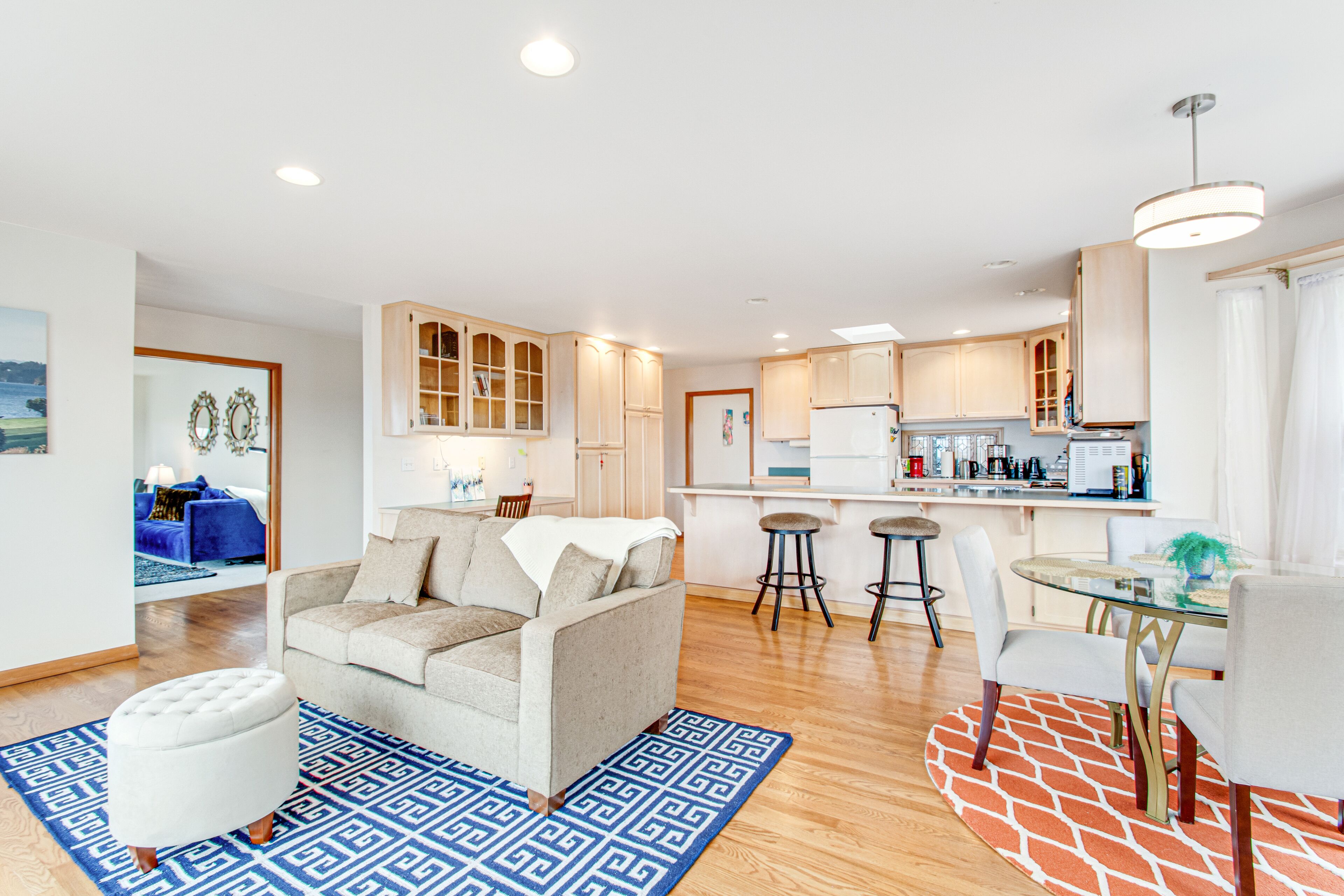 Waterfront, hillside home with amazing views, deck, fast WiFi, & gas fireplace