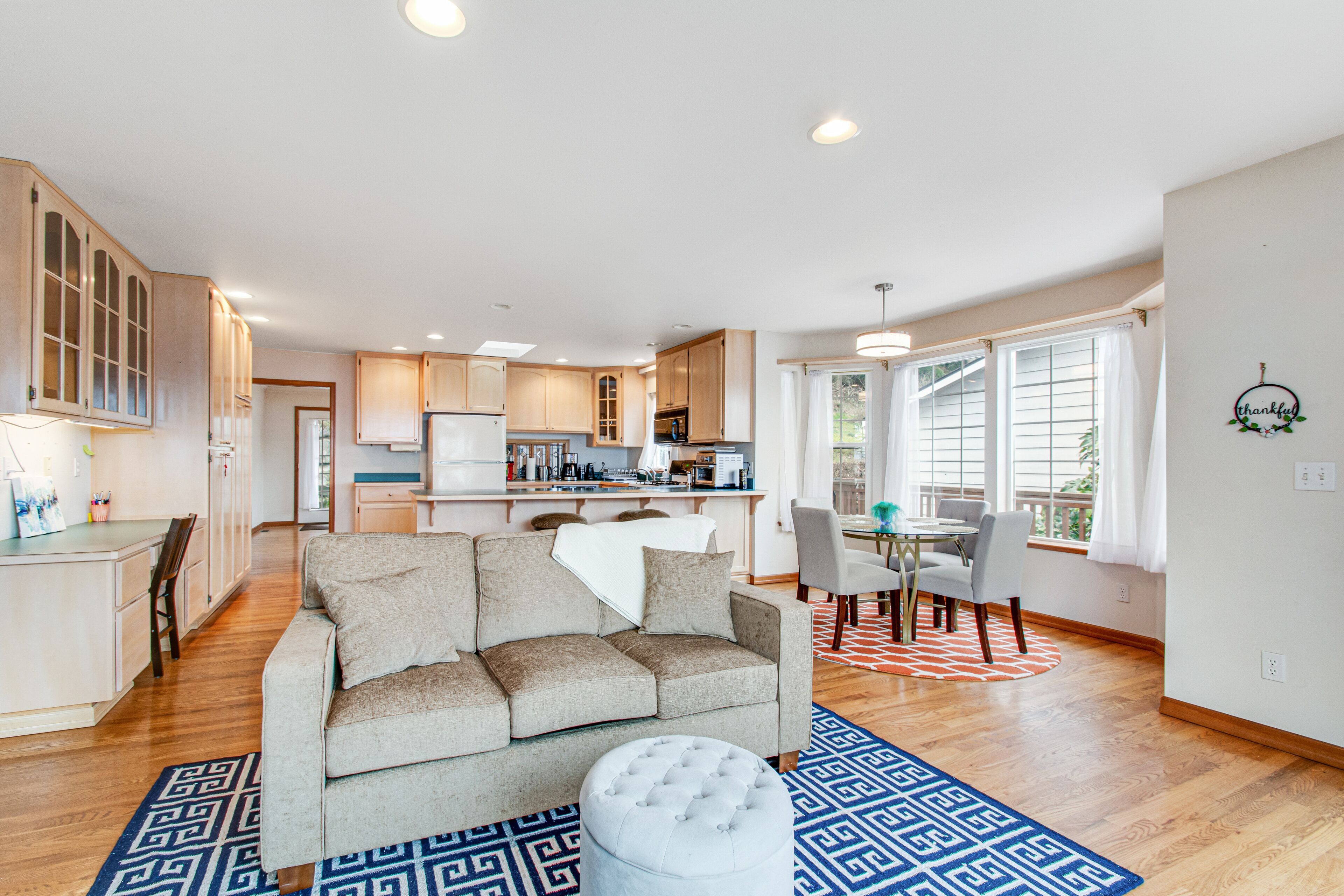 Waterfront, hillside home with amazing views, deck, fast WiFi, & gas fireplace