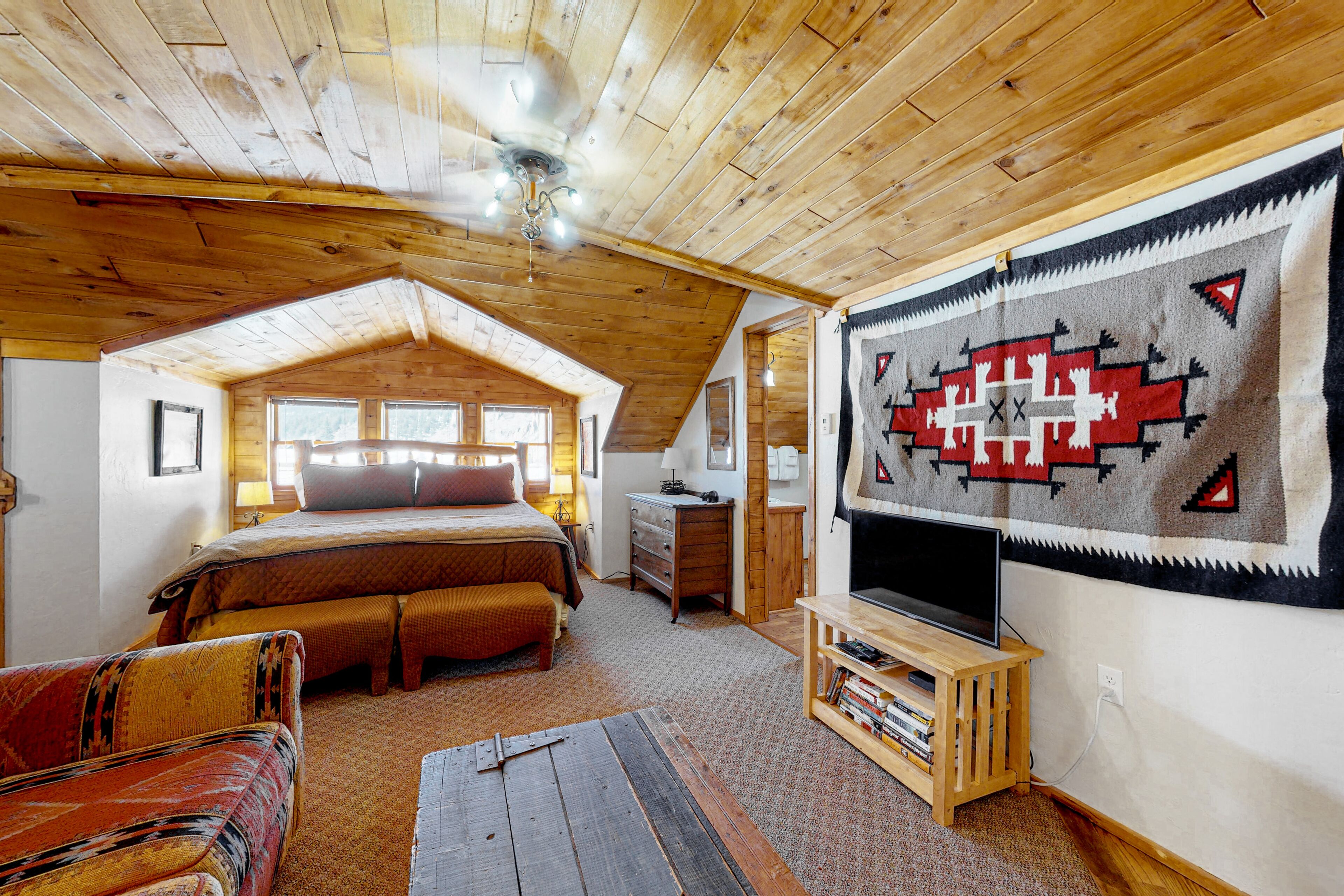 Mountain-view studio with private balcony, wood stove, and fast WiFi