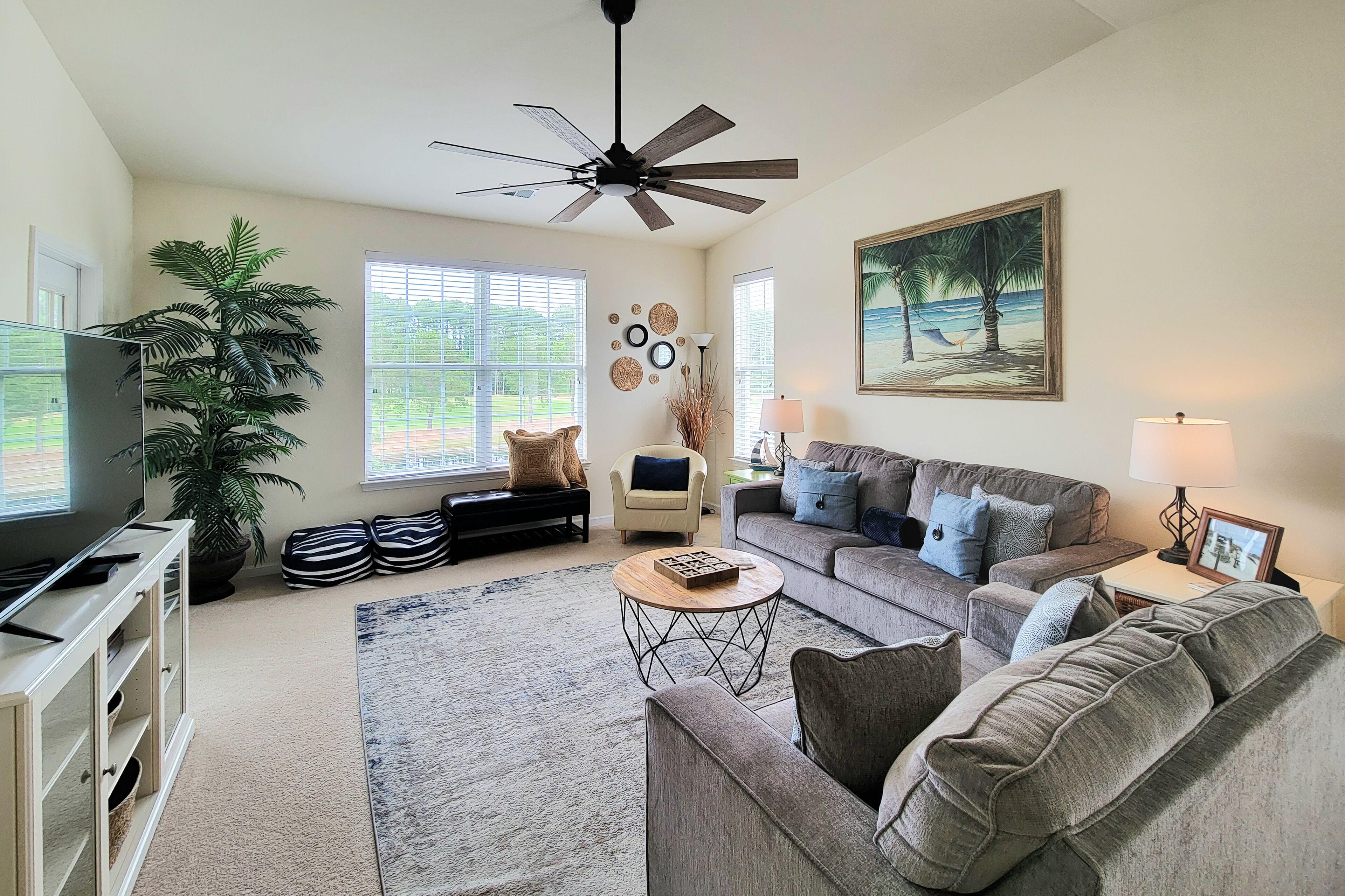 Top-floor, end-unit condo with water/golf course views, pools, tennis, & grills