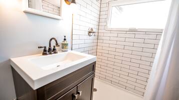 Shower, towels, soap, shampoo