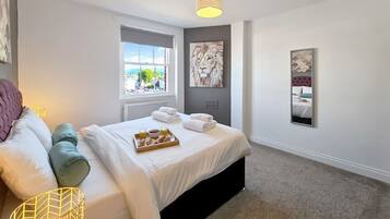 4 habitaciones, tabla de planchar con plancha, cuna de viaje y wifi