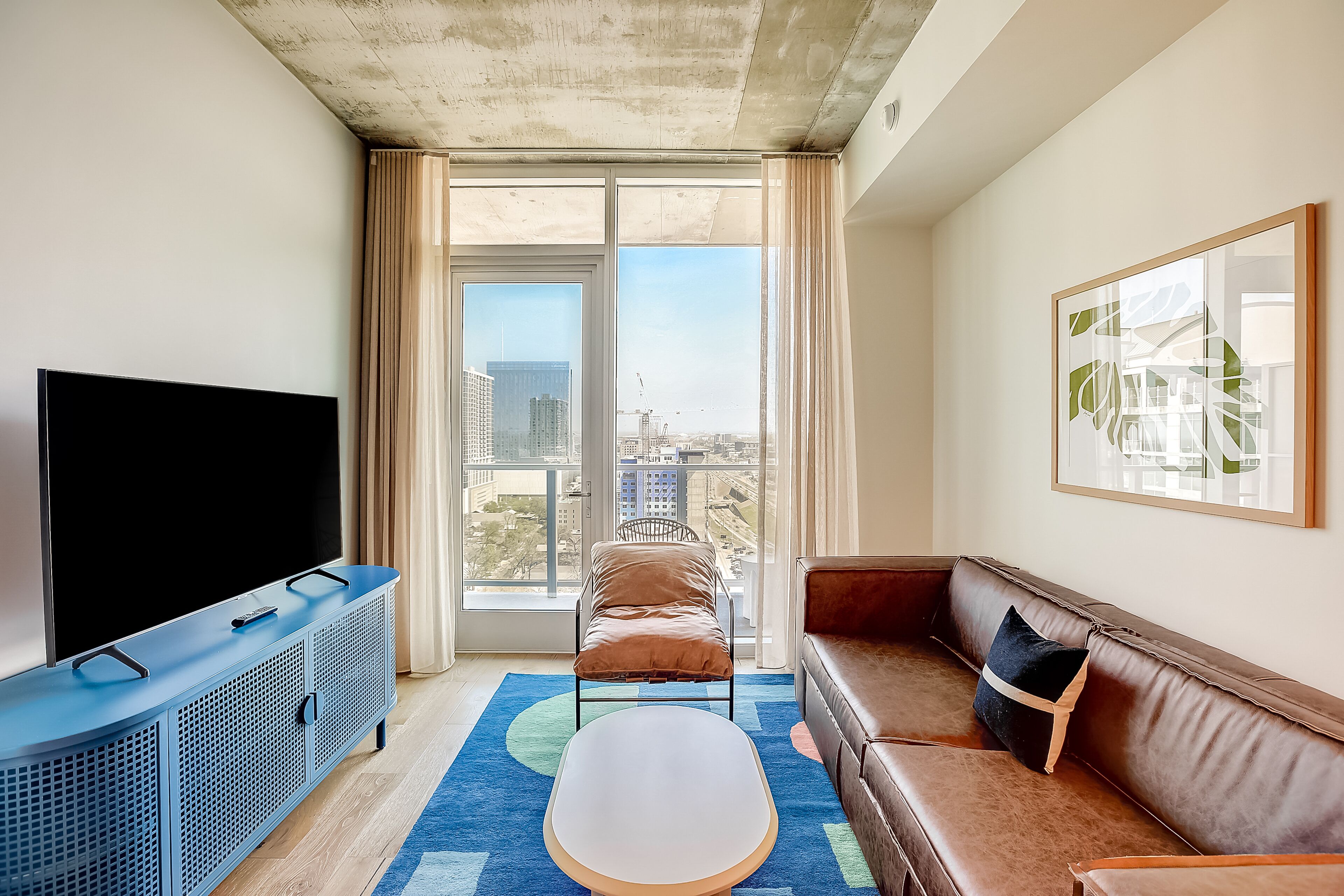 Brand new Rainey Street condo - skyline-view balcony - luxe rooftop pool & gym