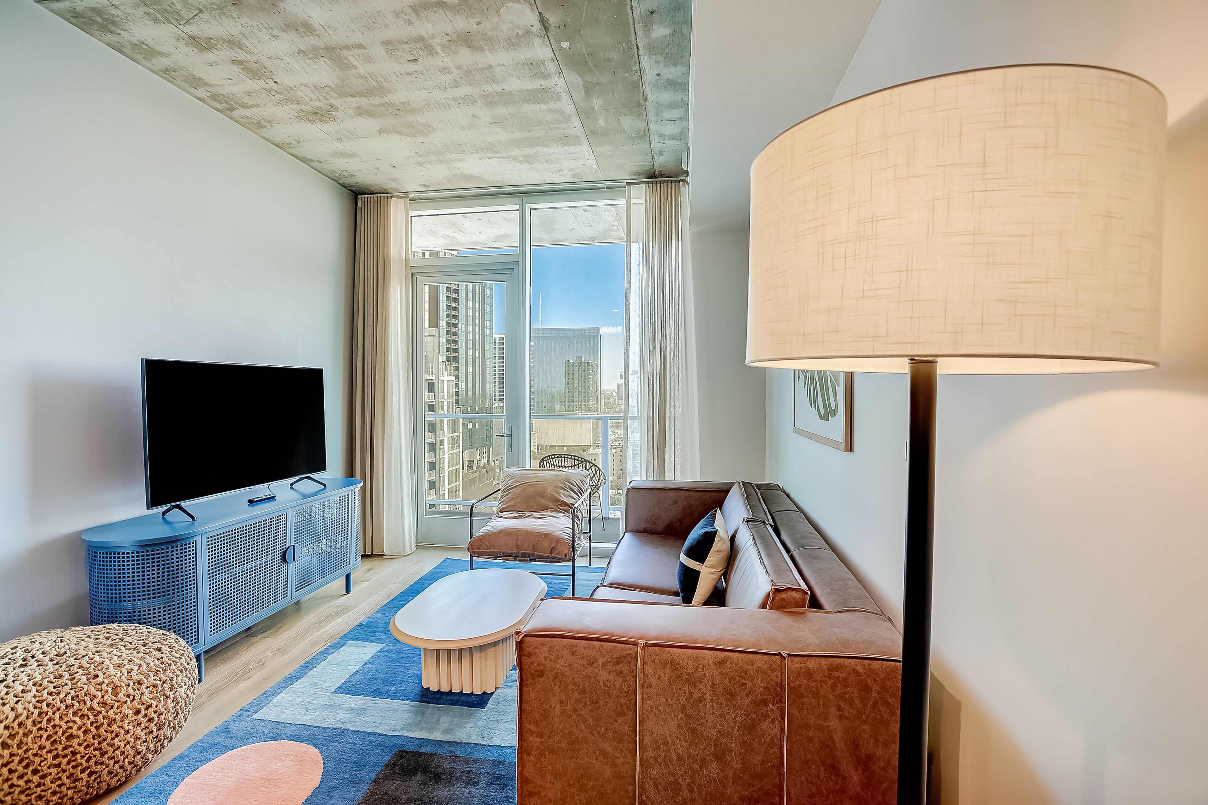 Brand new Rainey Street condo - skyline-view balcony - luxe rooftop pool & gym