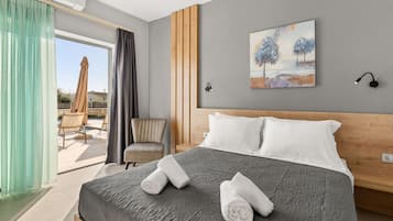 Habitación doble Deluxe | Ropa de cama de alta calidad y camas con pillow-top