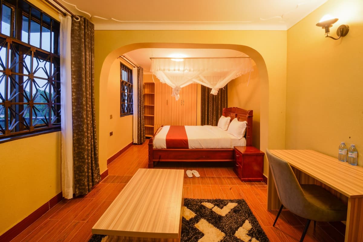 Suite ejecutiva | 1 habitación, ropa de cama de alta calidad y camas con efecto memoria