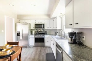 Fridge, microwave, oven, stovetop - Clean & Comfortable 4BR/2Bath w/King Suite located in Lexington, KY (Lexington)