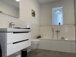 Badewanne, Haartrockner