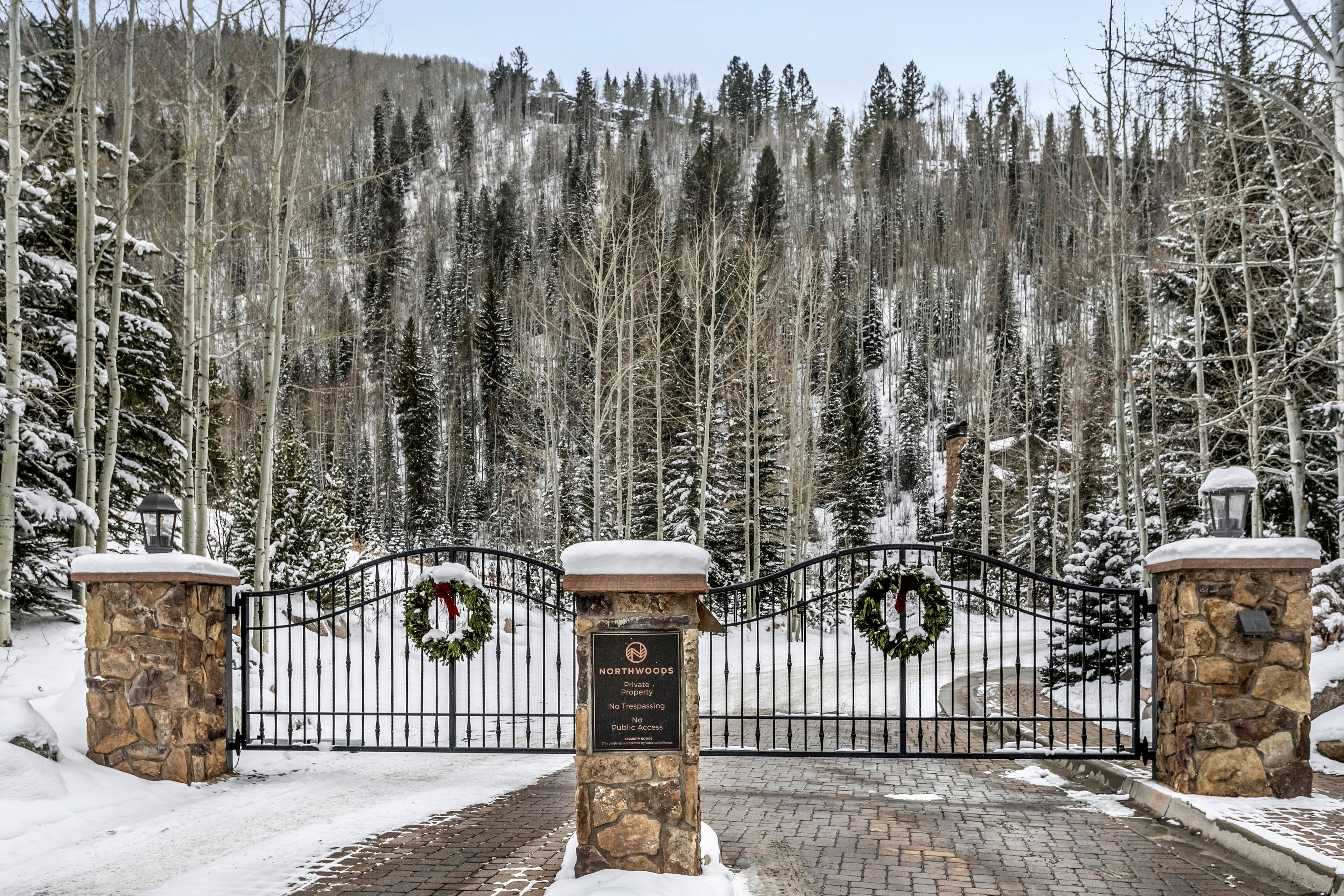 A gated entrance with a sign indicating private property and no public access.