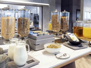 A breakfast buffet with various food items and beverages. - Novotel Liverpool Paddington Village (Liverpool)