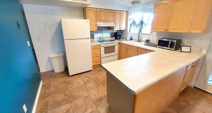 Clean & quiet retreat with private backyard near shopping & trails.