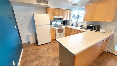 Clean & quiet retreat with private backyard near shopping & trails.