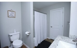 Combined shower/bathtub