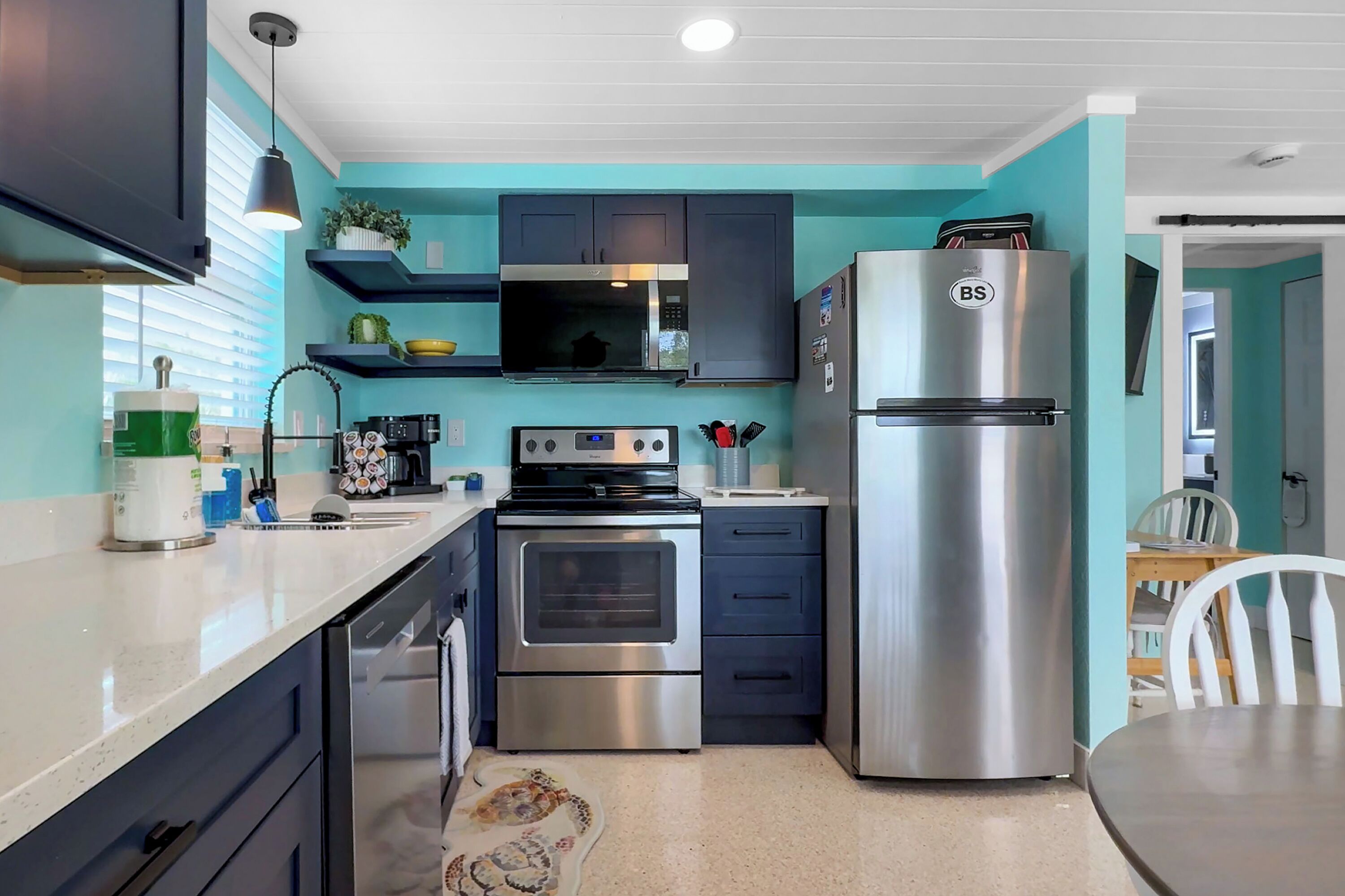 Coffee/tea maker, fridge, microwave, oven