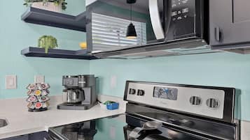 Coffee/tea maker, fridge, microwave, oven