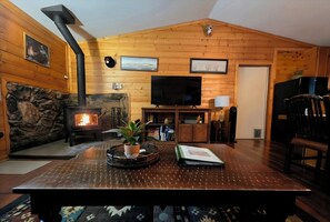 Our living room with a warm crackling fire! Prepare to relax. ©
