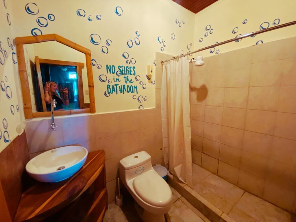 Shower, towels, soap, toilet paper