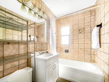 Designer toiletries, hair dryer, towels, soap at Neptune Oceanfront Rentals