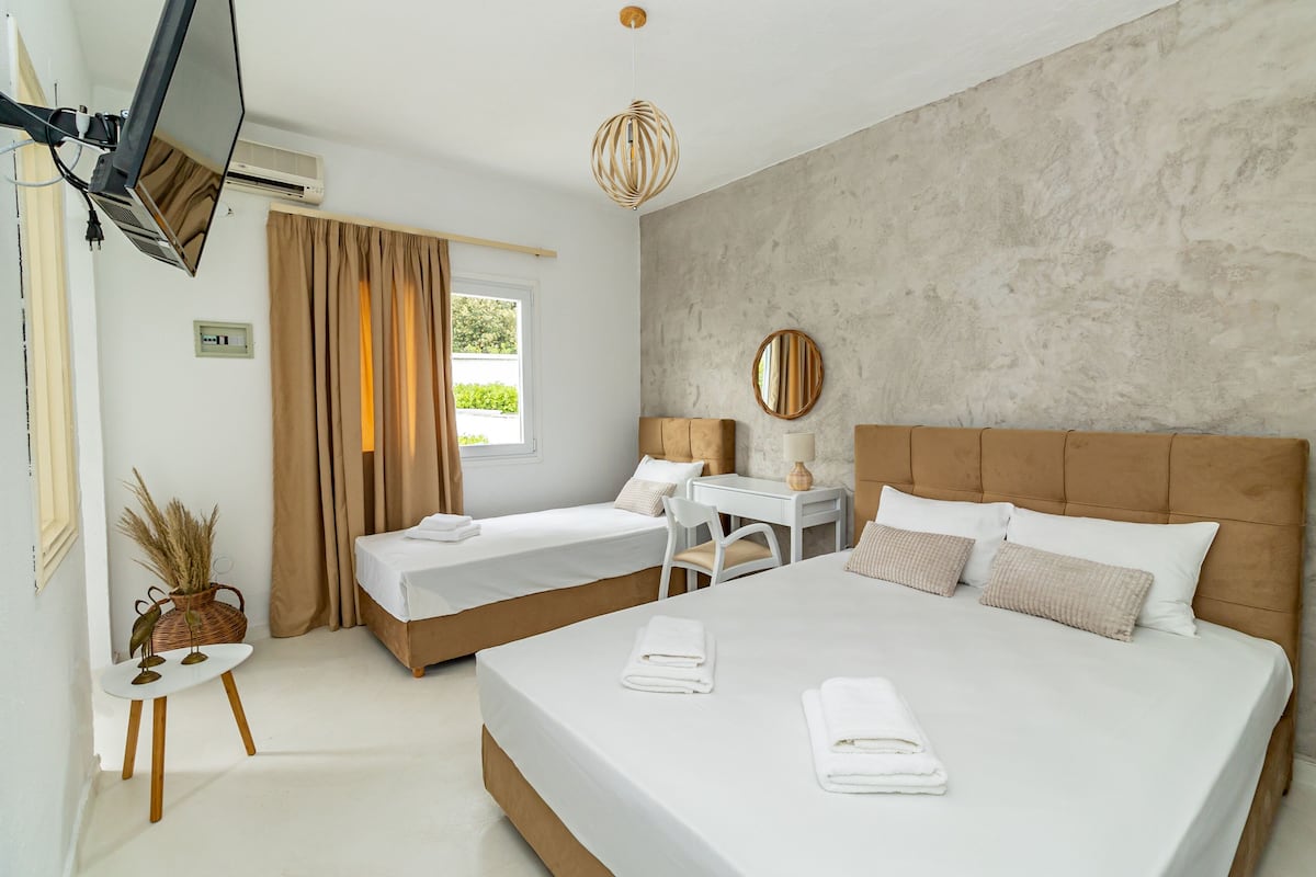 Junior Quadruple Room, Multiple Beds, Hot Tub, Garden View | In-room safe, desk, free WiFi