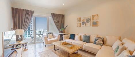 Classic Apartment | Living area | 32-inch flat-screen TV with cable channels, TV