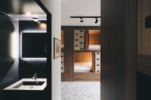 Shower, hair dryer, towels, toilet paper