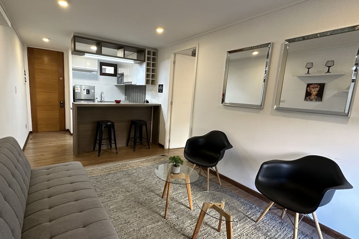 Apartment, 1 Bedroom | Living area | 43-inch Smart TV with cable channels, TV