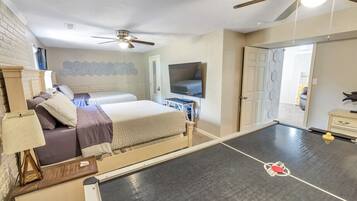 1 bedroom, desk, iron/ironing board, travel crib
