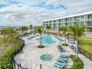 Outdoor pool, a heated pool - Harbor Island beach house with private and public pools. (Melbourne Beach)