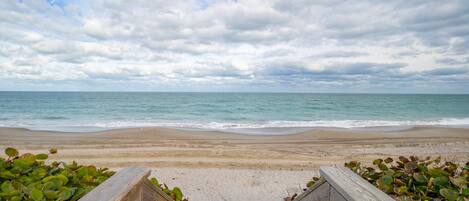 On the beach, sun loungers, beach towels