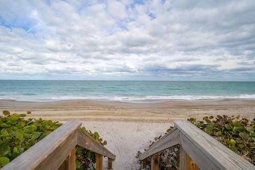 Harbor Island beach house with private and public pools.