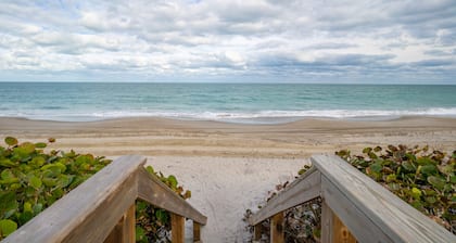 Harbor Island beach house with private and public pools.
