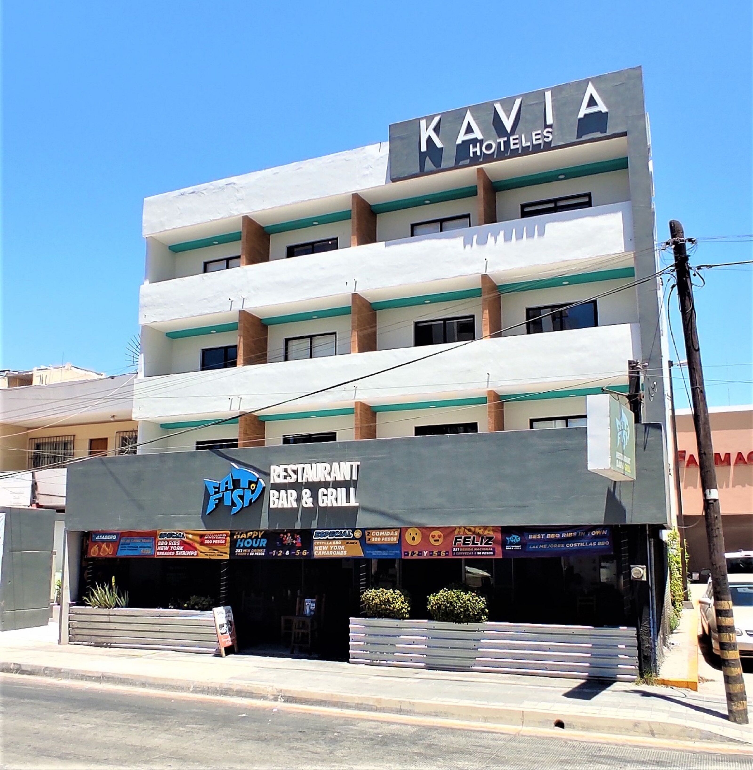 A hotel named KAVIA HOTELS with a restaurant bar and grill on the ground floor.