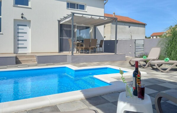 Outdoor pool, sun loungers