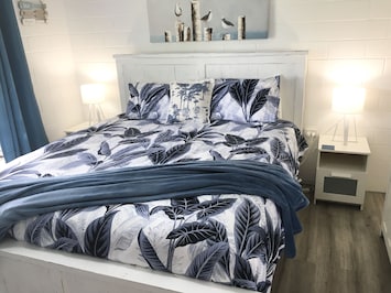 King bed in master bedroom listen to the ocean as you fall asleep