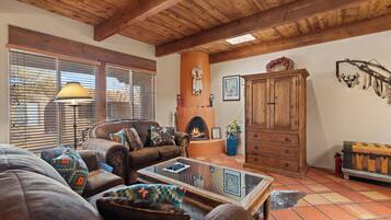 Smart TV, fireplace, DVD player, books