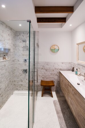 Bathtub, hair dryer, towels, soap