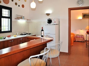Fridge, microwave, toaster, cookware/dishes/utensils